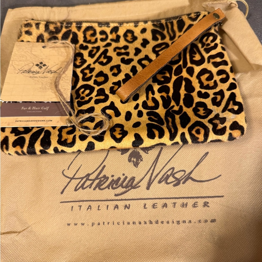 Patricia Nash with tags and dust bag!  Wristlet beautiful condition!  Like new